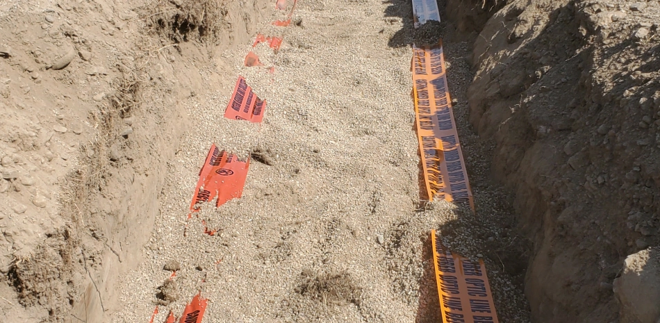 trenching excavation on a field